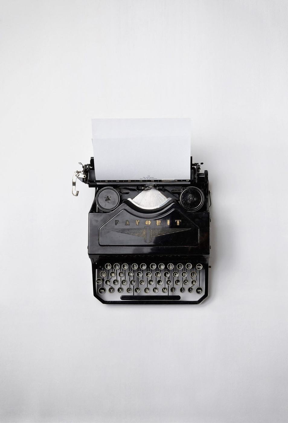Vintage typewriter on a white table